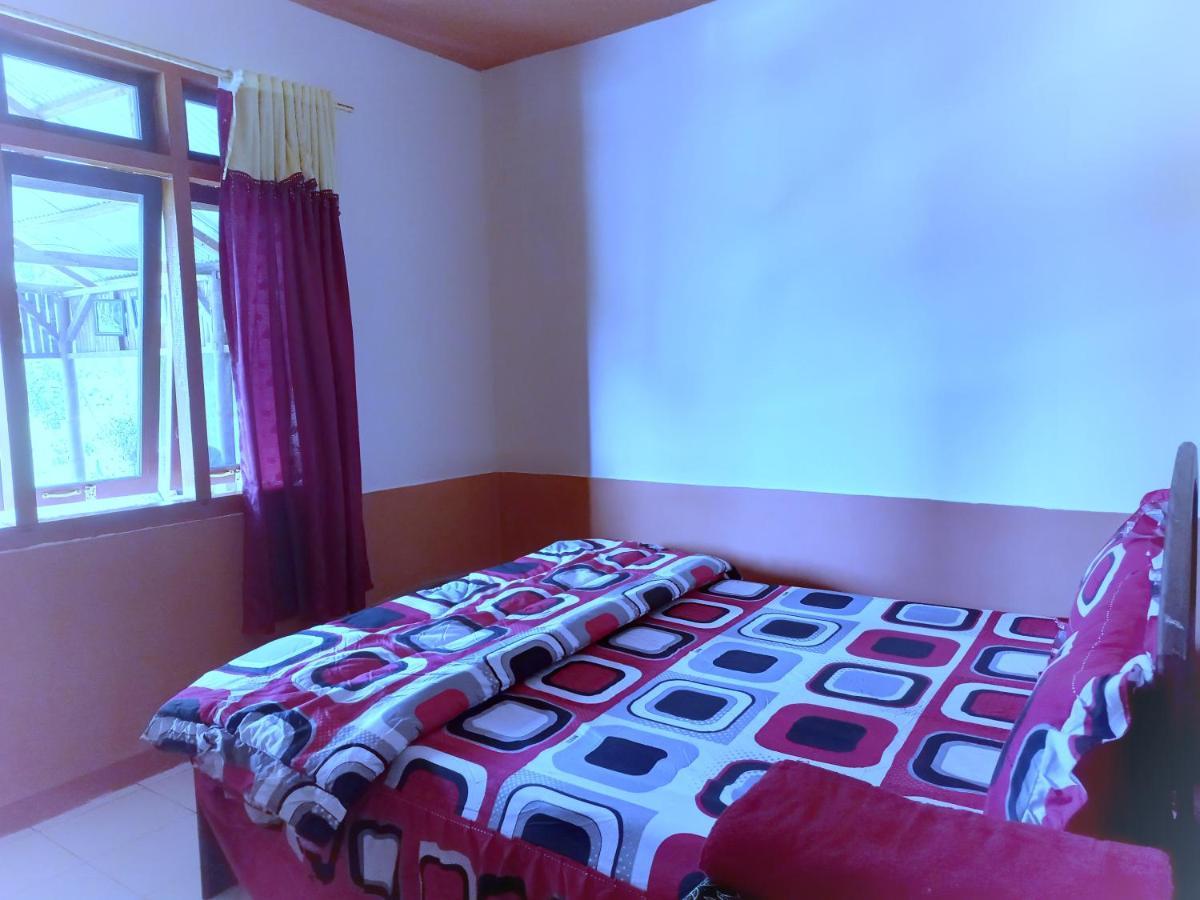 Sun Rice Homestay Ruteng Pokoj fotografie