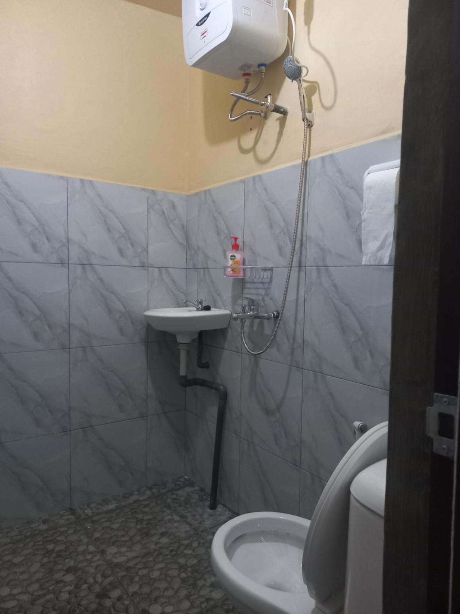 Sun Rice Homestay Ruteng Pokoj fotografie